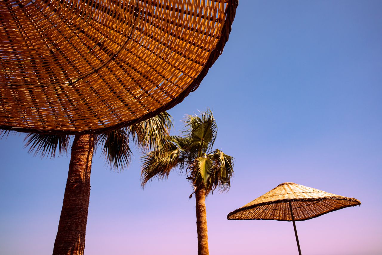 Beach umbrella representing holiday entitlement for umbrella contractors.